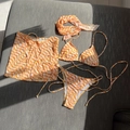 Detail of 4-piece bikini set with orange marble print and matching headscarf - S / Orange