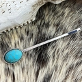 Detail van vintage turquoise bloem haarclip met een zilveren gedraaide rand - Ovaal Turkoois