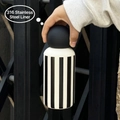 Minimalist 350ml 316 stainless steel bottle with black vertical stripes and ball cap - 350ml / Black Spherical Lid / White Vertical Striped
