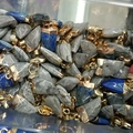 Bulk triangular natural stone pendants in grey and blue with gold plated metal edges - 10x20mm / Map Stone
