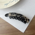 Banana hair clip with black and white tortoiseshell pattern for thick hair styling - Medium / Medium Light Leopard