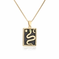 Collier vintage plaqué or 18 carats avec pendentif serpent et détails en zircon vert - Or Émail Noir