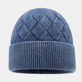 Detail of navy knit beanie showing textured diamond pattern and ribbed cuff for warmth - Blue