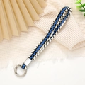 Detail of woven wrist strap in blue, white, and black with silver metal clasp - Royal Blue (K2511)