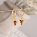 Macro detail of gold reindeer earrings with amber water-drop gems and black accents - Moose Style (5# Lobster)