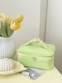 Borsa per trucco verde pastello con ricamo MIRTHD e pratica maniglia per il trasporto - verde chiaro
