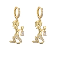 Detailed close-up of gold mermaid earrings with micro-paved zircons and teardrop crystals - Gold Mermaid