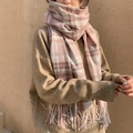 Close-up of soft pink and white plaid cashmere-like scarf with fringe details - Grid Light Pink