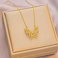 Elegant gold titanium butterfly pendant necklace with crystal inlay in a jewelry box - 6036 Butterfly Zircon / Gold