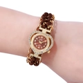 Golden heart-shaped quartz watch with brown woven chain strap on female wrist - Brown Heart Style (A1)