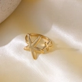 Golden starfish double element ring on beige silk background for summer beach jewelry - Golden Starfish