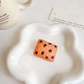 Realistic chocolate chip cookie hair clip made of resin with detailed baking texture - Square Cranberry Cookie
