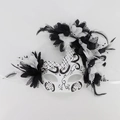 Detail of masquerade mask featuring black and white lace, feathers, and sparkling rhinestones - 2025 Dark Flame Day of the Dead