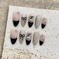 Handmade press-on nails with black French tips, luxury bows, and rhinestone accents - Extra Small (XS)