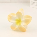 Claw clip hair accessory featuring a creamy white and yellow gradient plumeria flower - Yellow