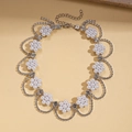 Elegant floral faux pearl necklace with rhinestone fringe and vintage silver choker style - Silver