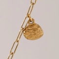 Golden paperclip chain necklace featuring a textured irregular bell pendant accessory - Mini Shell Pendant