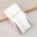 Stack of clear plastic packaging bags for hair ties and jewelry accessories - 6.5x12cm Clear Bag / 1 Piece