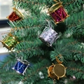 Colorful festive drum ornaments in red, gold, and blue hanging on a green Christmas tree - 6Pcs Large Colorful Drum Christmas Ornaments