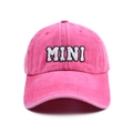 Close-up of pink baseball cap featuring white fuzzy MINI letter embroidery and stitching - Kids MINI Style / Rose Red