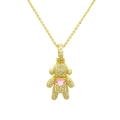Macro detail of gold-plated bear pendant featuring white zircon and pink heart gemstone - Bear-Pink Heart