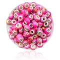 Pink ink painted resin beads with silver metal cores in a white bowl for DIY bracelets - Magenta Multicolor