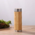 Bamboo vacuum thermos with stainless steel lid and base on a wooden tabletop - Bamboo Node Cup (Steel Lid)