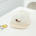 Detailed view of breathable mesh toddler hat with cute brown bear embroidery and OK patch - 48-50cm (1-3 Years) / Beige