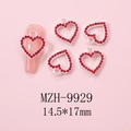 Macro view of silver hollow heart nail art charm with red rhinestones and 14.5x17mm size - Silver Large Heart Pave Red Rhinestone Charm (9929)
