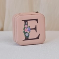 Portable pink PU leather jewelry box with floral letter E print and zipper closure - Print E