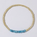 Fashionable beaded bracelet with gold copper beads and light blue faceted gemstone beads - Sapphire Blue
