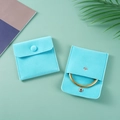 Cyan velvet jewelry pouch with snap button closure and a gold ring storage accessory - Double-sided Fleece Snap Button Style - Light Blue; 7*7cm Fleece Bag