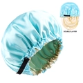 Close-up of double-layer satin bonnet in light blue and beige with adjustable strap - Light Blue