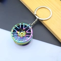 Macro shot of a neo-chrome multi-spoke wheel hub keychain with vibrant metallic finish - Wheel Rim / AB Color