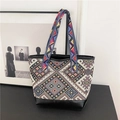 Ethnic style canvas tote bag with geometric woven patterns and black leather trim - Black