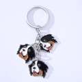 Detailed close-up of alloy keychains featuring triple Bernese Mountain Dog enamel charms - Bernese Mountain Dog