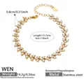 Detail of gold stainless steel bracelet with white pearls and S.steel hallmark - 17+5cm / Gold