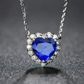 Elegant silver necklace featuring a blue heart-shaped gemstone with a diamond halo - Heart-shaped Blue Diamond Necklace Xl-122