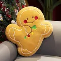 Gingerbread man plush pillow with colorful embroidery on a warm cozy holiday sofa - Gingerbread Man / 14cm