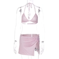 Detailed view of pink bikini top and polka dot wrap skirt on a display mannequin - S / Pink