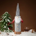 Christmas gnome wine bottle cover in gray felt with black and white plaid pointed hat - Grey
