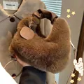 Brown faux fur hobo handbag with pleated leather handle and decorative metal hangtag - Dark Khaki