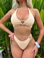 Close-up of textured beige bikini featuring white heart-shaped rings and haltered top - S / Off White