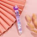 Purple multi-color unicorn ballpoint pen with 3D unicorn topper on pink background - Moon Unicorn - Purple