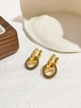 Close-up of 18K gold-plated hoop earrings with detachable black pavé crystal charms - Gold Black Zirconia