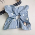 Blue plaid scrunchie featuring a white bow pattern and a cute brown bear charm detail - Blue White Bow Bear