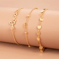 Three-piece gold-tone bracelet set featuring Love lettering, stars and round sequins - KC Gold Love Art Collection (2790)