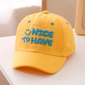 Close-up of bright yellow cotton baseball cap with blue 3D embroidery and happy face - 52cm (2-5 Years) / Yellow
