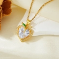 Macro shot of gold heart pendant with white zircon and green leaf on silk background - Gold White Zircon Heart Necklace (T021)