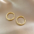 Minimalist golden round hoop earrings displayed on premium elegant silk fabric background - Copper/925 Silver Pin / Hoop 17 (Smooth Ring) / Gold
